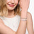 Thomas Sabo Charm-Armband mit schimmernden, weißem Kaltemaille Silber – X0287-007-21-L17